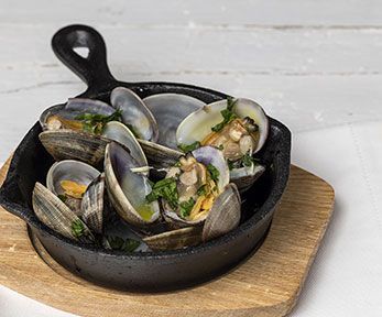 Come cucinare le vongole con guscio