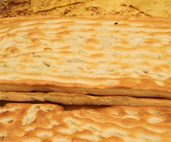 La crescia con i ciccioli di maiale