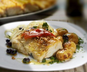 Cucinare il pesce sulla pietra ollare