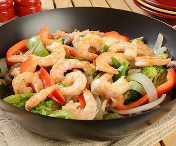 Cucinare il pesce nel wok