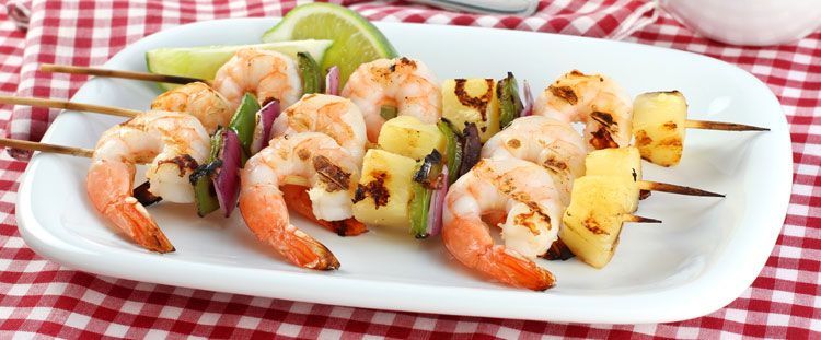 Come cucinare gli spiedini di pesce