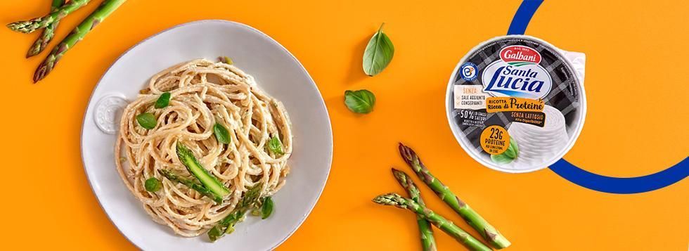 Spaghetti con punte di asparagi e riccioli di ricotta