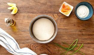 Pizza con salmone affumicato