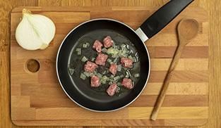 Risotto con carciofi e salsiccia Risotto con carciofi e salsiccia