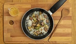 Risotto con carciofi e salsiccia Risotto con carciofi e salsiccia