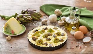 servire la quiche ai carciofi ben calda