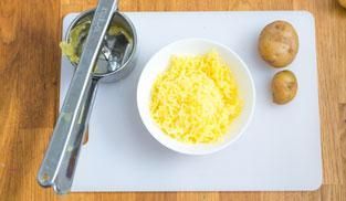 schiacciare le patate